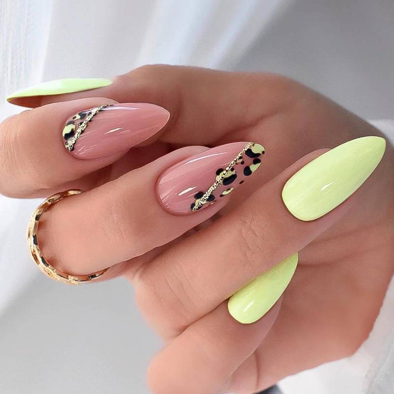 Yellow Nails with Animal Print Nail Art